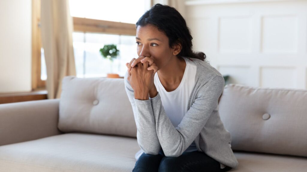 Woman sitting and thinking