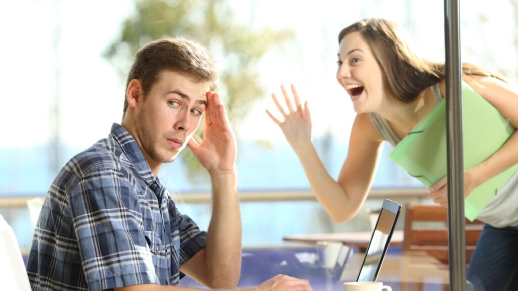 Man ignoring and rejecting woman in window