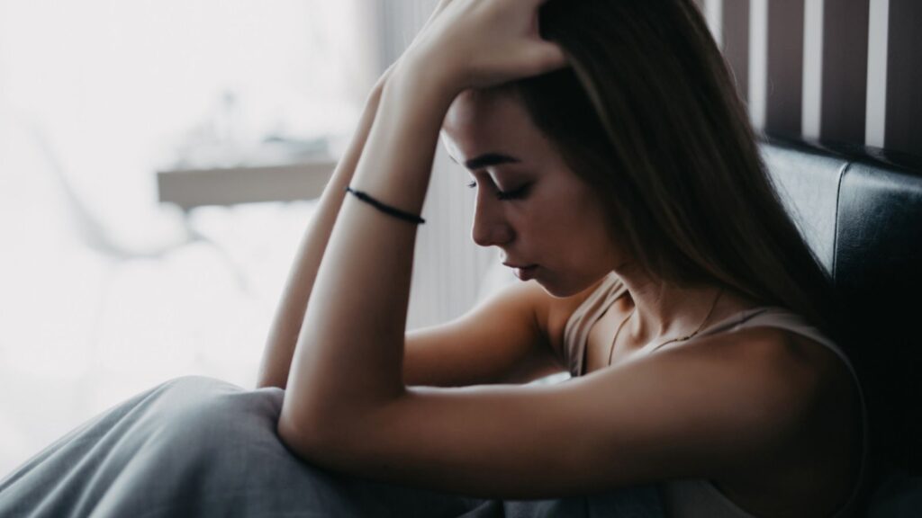 Young woman feeling sad